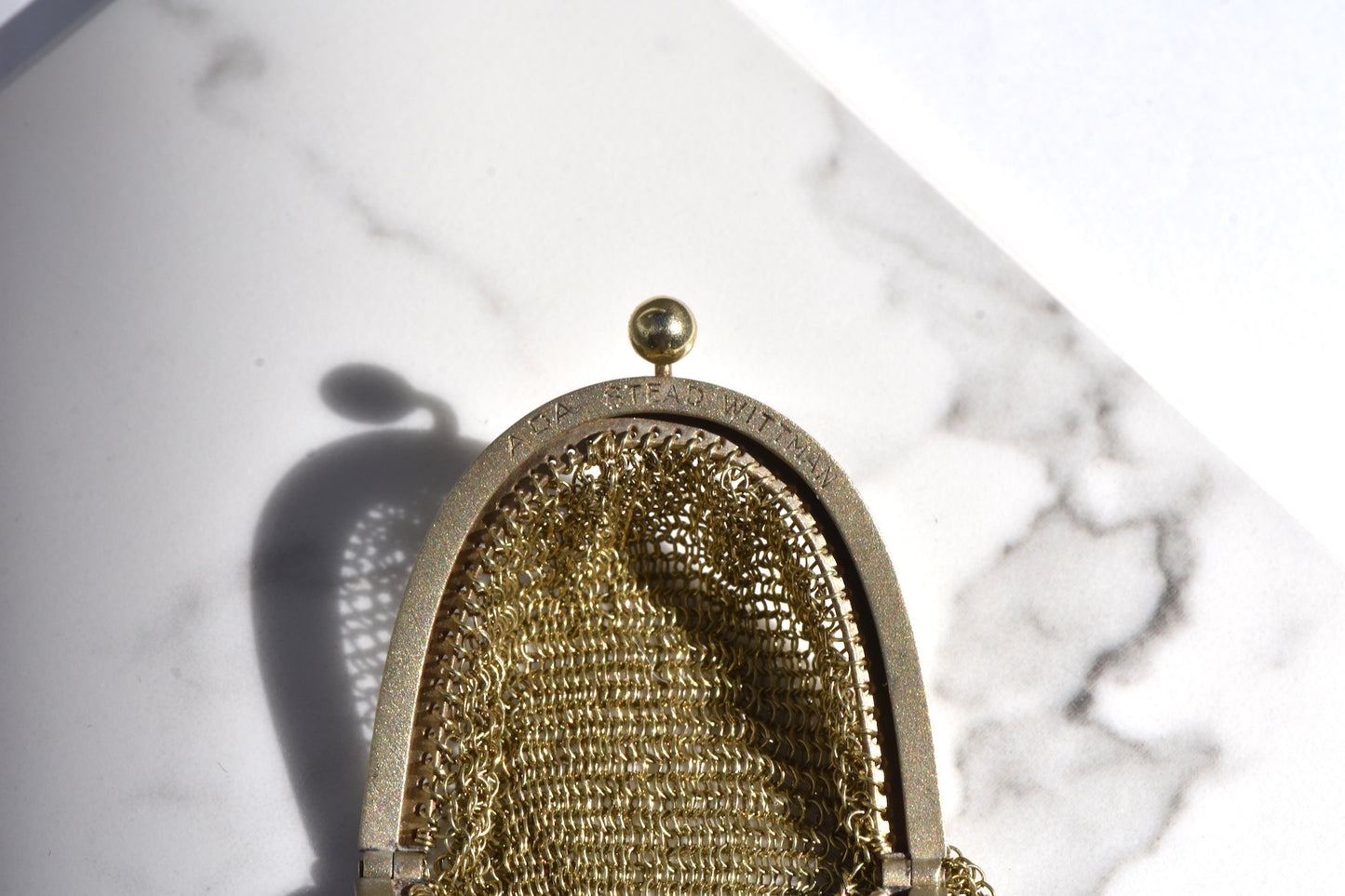 The Golden Chainmail Pendant