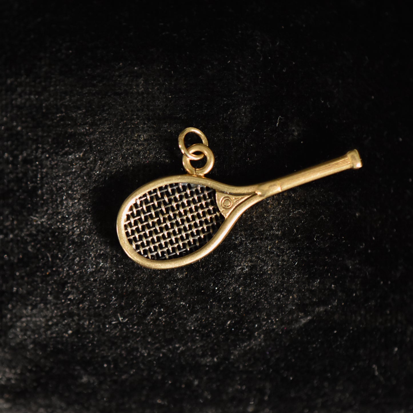 The Tennis  Racket Charm