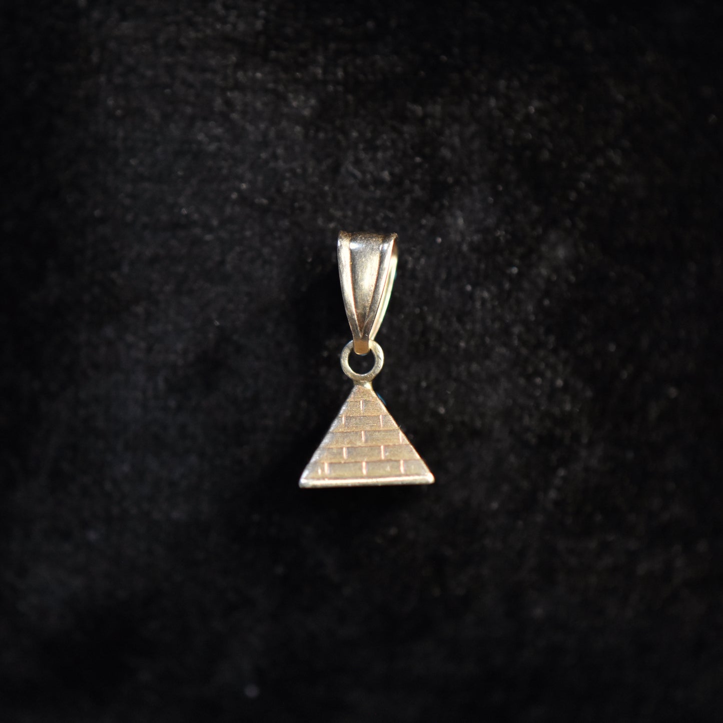 The Pyramid Charm