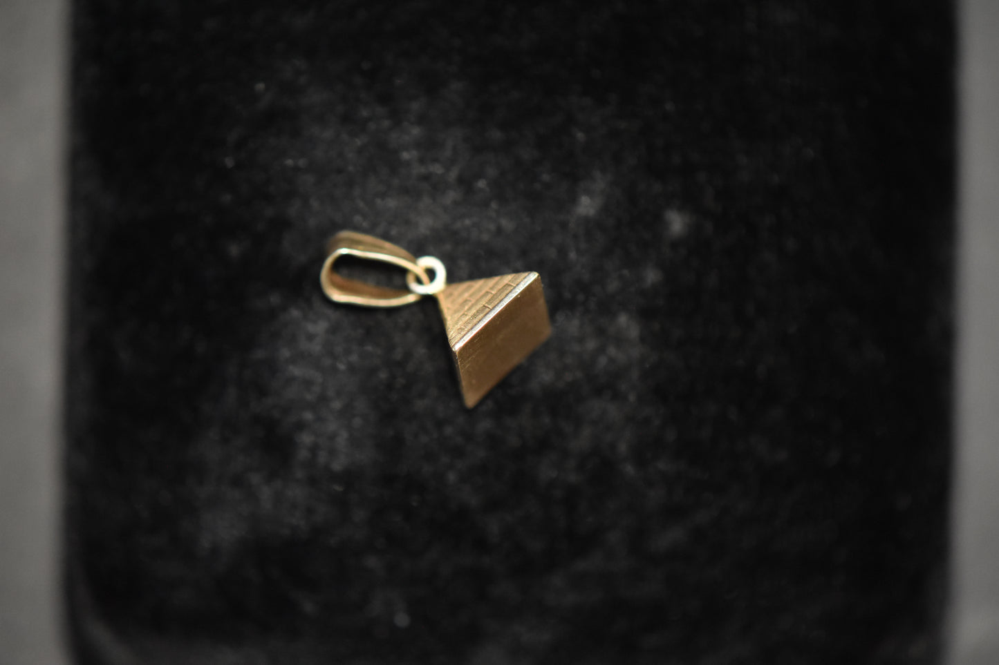 The Pyramid Charm